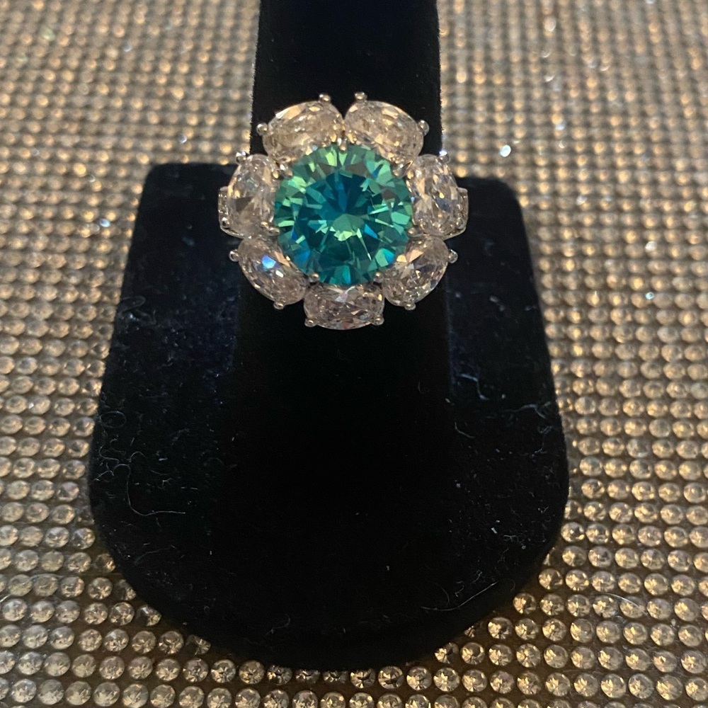 Blue Topaz With Sterling Silver Flower Setting Birthstone Ring